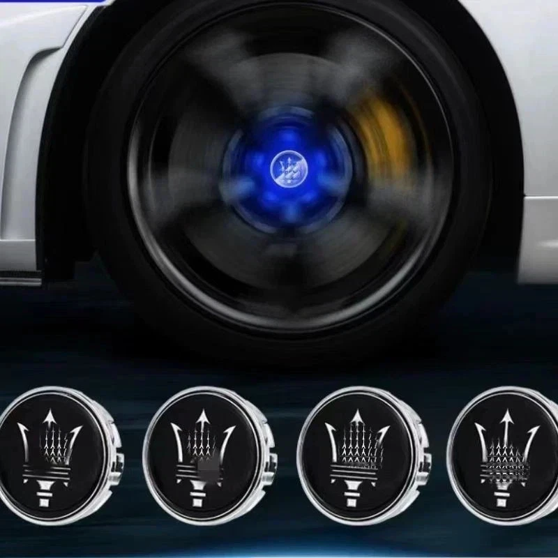 Tapacubos de luz LED flotantes azules autoalimentados de 60 mm 4 piezas para Maserati Foto 1 de 4