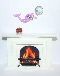 Reloj de pared para casa de muñecas miniaturas sirena lavanda náutica escala 1:12 nuevo - Imagen 1 de 8