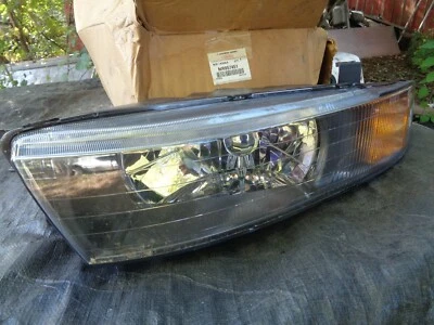 NEW ORIGINAL MR957451 2002 2003 MITSUBISHI GALANT HEADLIGHT LAMP LH DRIVERS SIDE - Image 1 of 4