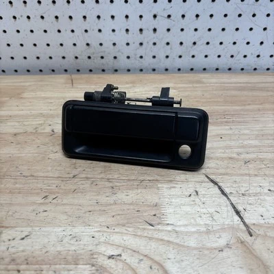 Toyota Celica Supra LH 1984 1985 lado izquierdo del conductor exterior manija de puerta negra Foto 1 de 4