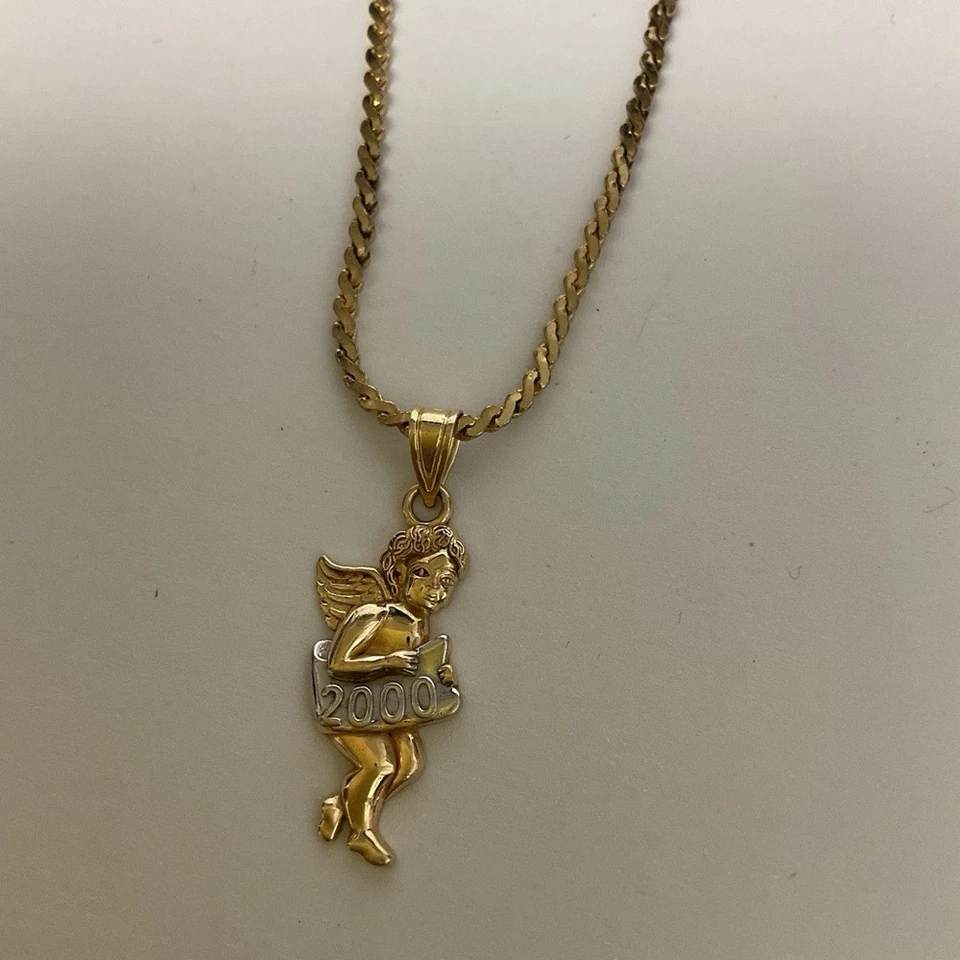 Collar Colgante MICHAEL ANTHONY 14k ORO AMARILLO QUERUBÍN 2000 AÑO NUEVO 6 gramos Usado en Excelente Condición Foto 1 de 4