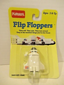 Vintage 1989 Playskool Flip Floppers Space Shuttle Wind Up Toy on Original Card - Bild 1 von 6