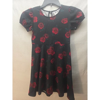Vestido Autoestima Niñas Talla Med 8 Negro Floral Manga Corta Peplum Cuello Redondo Foto 1 de 4