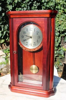 Bulova Wall Clock Chime 24.5 in. x 15 in. Pendulum Glass Rectangle Wood Brown - Image 1 of 4
