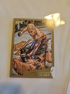 DAMAGED TITO ORTIZ AUTOGRAPH SIGNED TRADING CARD UFC  HEAVYWEIGHT CHAMPION - Picture 1 of 3