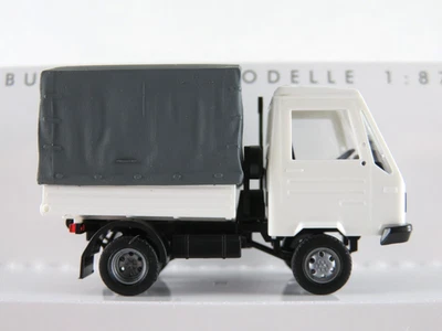 Busch 42250 Multicar M26 Pritsche/Plane (1991) in weiß 1:87/H0 NEU/OVP - Bild 1 von 4