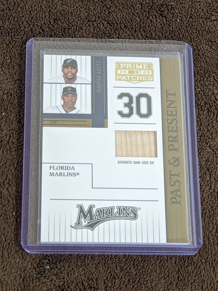 2005 DONRUSS ПРЕМЬЕР НАШИВКИ ПРОШЛОЕ НАСТОЯЩЕЕ /150 ЛЕТУЧАЯ МЫШЬ РЕЛИКВИЯ КЛИФФ ФЛОЙД МАРЛИНС - Изображение 1 из 1