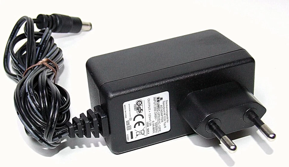 UMEC Speedport W723V Typ B Netzteil 12V 1,5A UP0181C-12PE Steckernetzteil - Bild 1 von 1