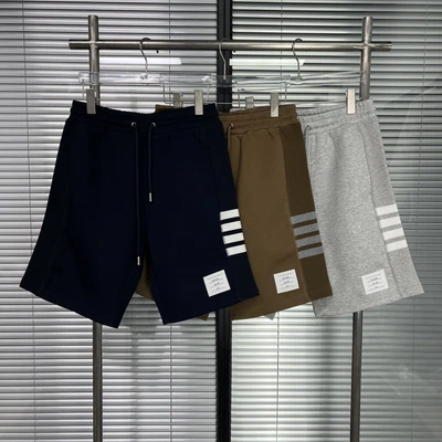 Pantalones cortos informales con cordones de algodón a rayas nuevos de verano Thom Browne para hombre/mujer Foto 1 de 4