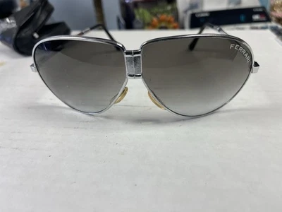 Gafas de sol de aviador plegables Ferarri 'nuevas' de colección años 70 metal dorado/estuche utilería de película Foto 1 de 4