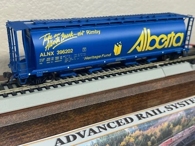 ALBERTA HERITAGE- RIMBY WHEAT CYLINDRICAL COVERED 4 BAY HOPPER CAR- HO Scale NEW - Image 1 of 4