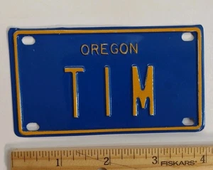 Placa de identificación de bicicleta vintage Oregon TIM azul y dorado Timothy Tim - Imagen 1 de 3