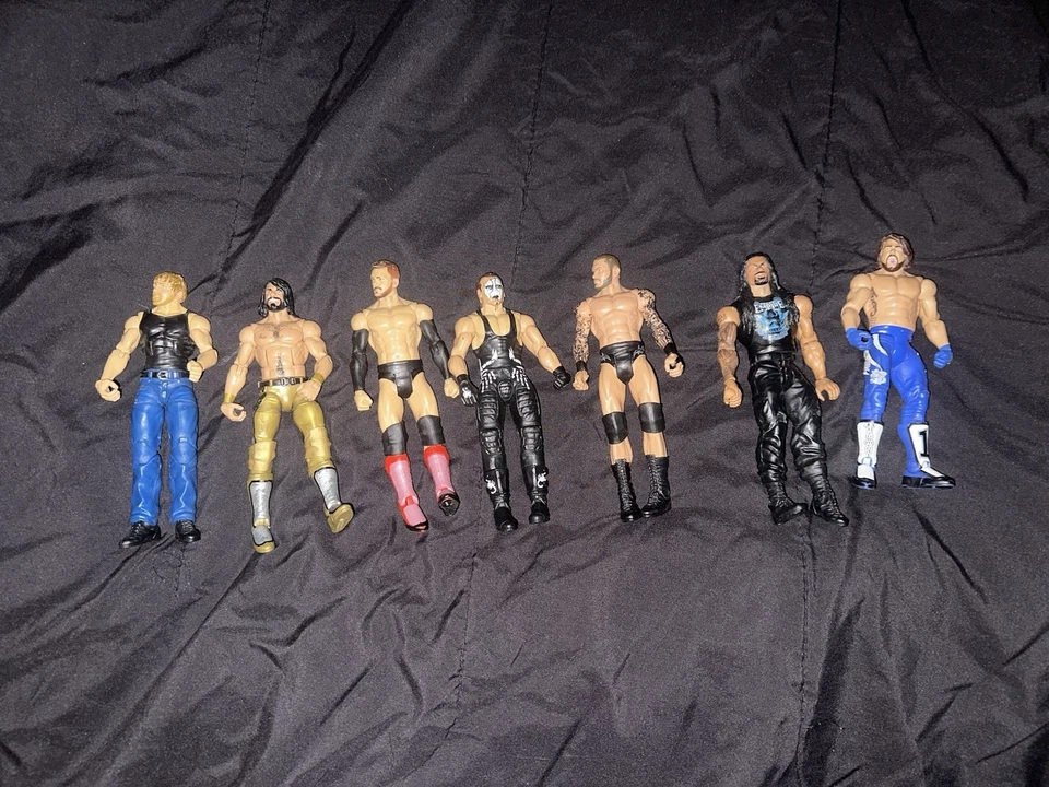 WWE luchadores 2 élites y 5 normales Foto 1 de 4