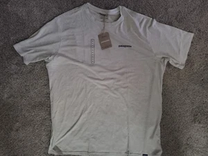 Patagonia Men's Capilene Cool Daily Graphic S/S T-Shirt Waters Boardshort Pumice - Picture 1 of 3