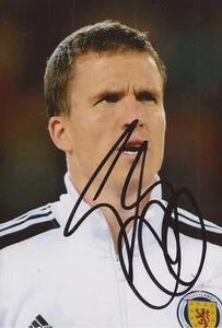 SCOTLAND & WIGAN: GARY CALDWELL SIGNED 6x4 ACTION PHOTO+COA - Picture 1 of 1