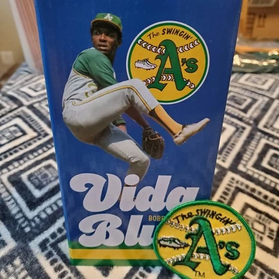 2024 SGA Vida Blue Bobblehead PLUS Vintage A's Patch Lot Oakland Athletics - Image 1 of 4