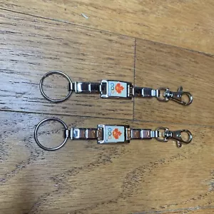 2 - Canadian Maple Leaf with Olympic Flame Keychains - Picture 1 of 5
