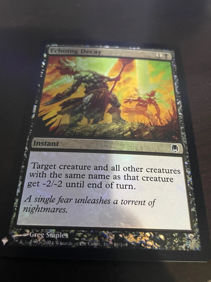 Echoing Decay Darksteel Foil - Image 1 of 1