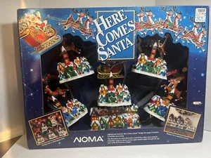NIB Vintage Noma Here Comes Santa Claus Lights Music Animated Christmas Village - Picture 1 of 11