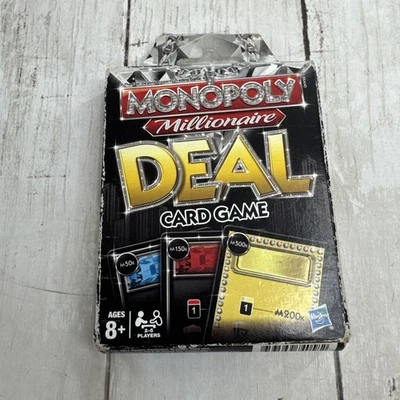 Hasbro Monopoly Millionaire Deal Card Game in scuffed box 2009 - Image 1 of 4