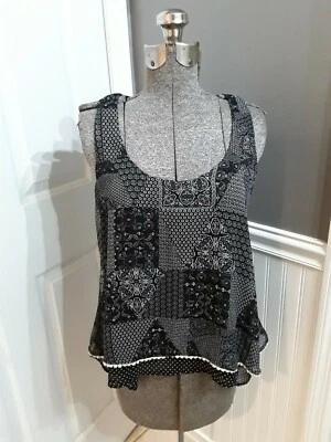 Camiseta sin mangas Living Doll negra/blanca para mujer talla S en excelente estado 🙂 ENVÍO RÁPIDO 🙂 Foto 1 de 4