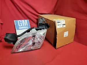 NOS Genuine GM Driver Side Headlamp 10368389 - Picture 1 of 6