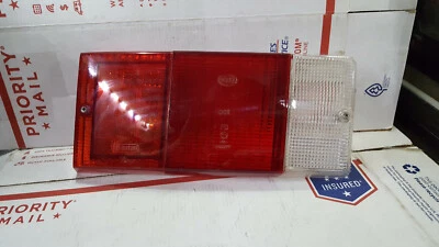 Lente luz trasera izquierda Volkswagen 43222R7 71-72 411 Squareback tipo 4 Hella. NUEVO. Foto 1 de 4