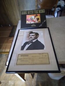 Clark Gable personal check from 1943 for $127.38,with oficial picture & VHS Tape
