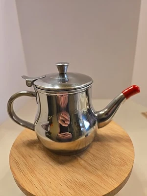 Olla de aceite de acero inoxidable resistente para almacenar aceite de freír contenedor de aceite de cocina Foto 1 de 4