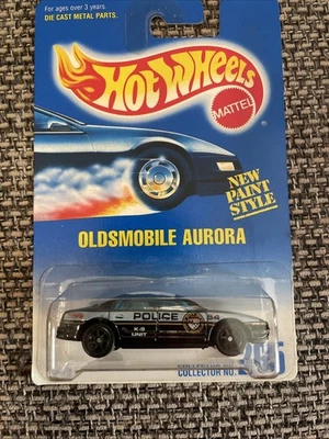 Hot Wheels No. Oldsmobile Aurora Police 265 con 7SP negro nuevo en tarjeta 1997 Foto 1 de 3