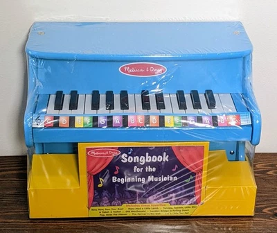 Melissa & Doug 学习演奏蓝色钢琴 带 25 键和彩色编码歌曲集 — 第 1/2 张图片