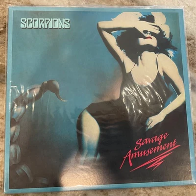 SCORPIONS LP/CD SAVAGE AMUSEMENT 2015	50th Anniversary Deluxe ED 180G Remaster Foto 1 de 4