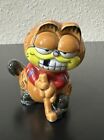 Figurine en céramique Garfield the Cat joueur de hockey Enesco 3" dent manquante vintage
