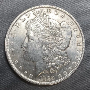 1889 Morgan Silver Dollar - Picture 1 of 10