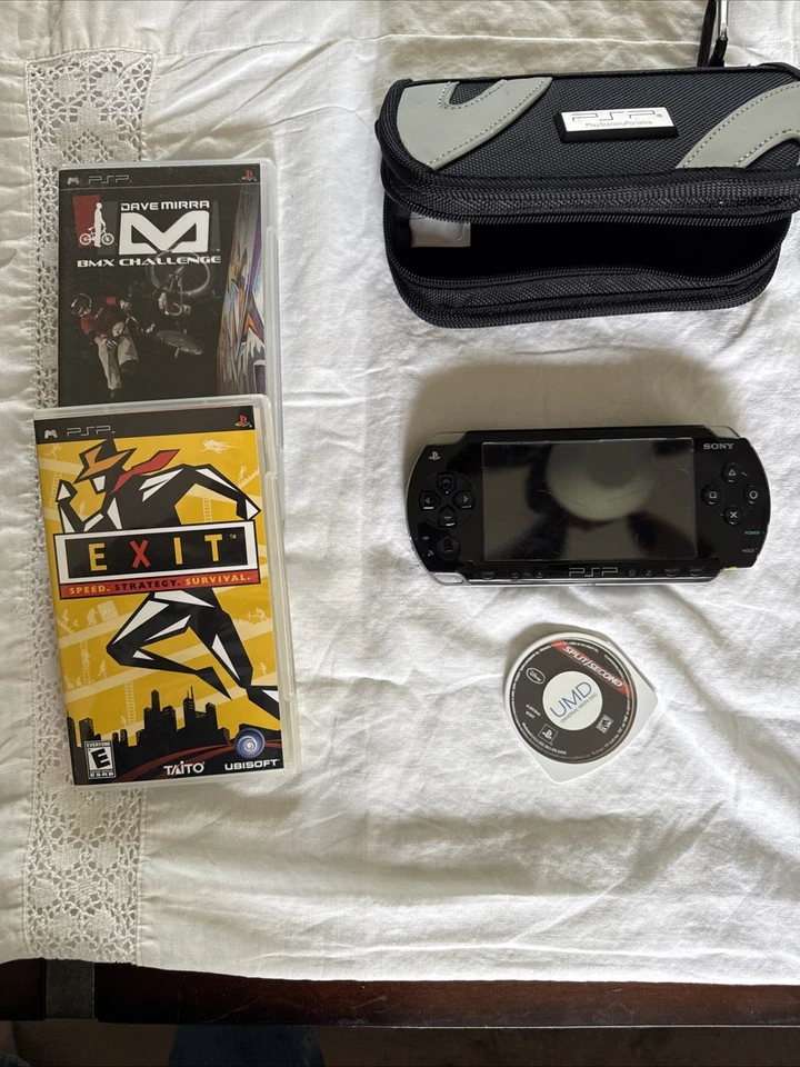 Sony PSP 1001 Black/With Case And 3 Games No Charging Cords - Image 1 of 4