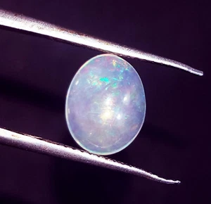 Piedra preciosa suelta 100 % natural de ópalo de Etiopía certificada de 0,80 quilates con regalo gratis - Imagen 1 de 6