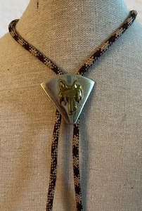 Vtg Western Cowboy Crossed Pistols Bolo Tie Gold Tone on Silver Tone Brass Tips - Picture 1 of 5