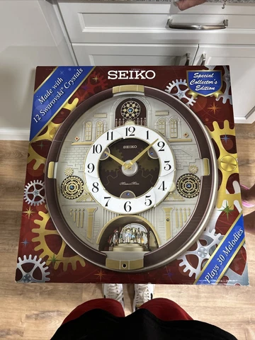 SEIKO special collectors edition clock. 30 Melodies And 12 Swarovski Crystals Cover
