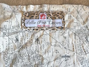 Falda de cama para cuna Lollie Posh Designs con volantes antipolvo excelente estado temática de viaje - Imagen 1 de 3