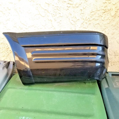 '99-'02 Isuzu Rodeo/Pasaporte Tapa de parachoques trasero izquierda usada sin defectos (negro) Foto 1 de 4