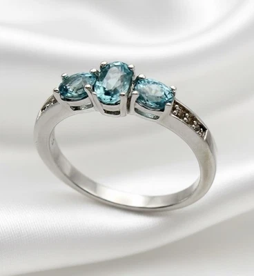Anillo TGGC de tres piedras - Topacio azul y blanco banda de plata de ley 925 Foto 1 de 4