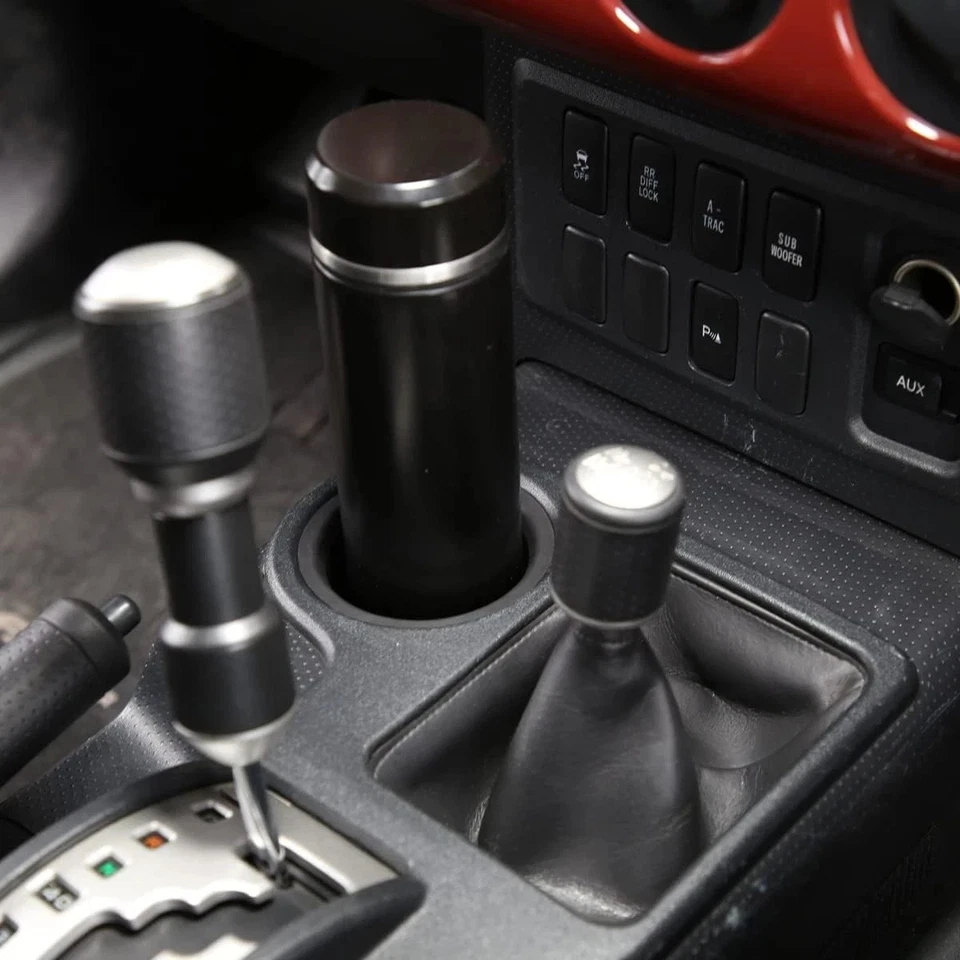 TOYOTA FJ CRUISER CONSOLE CUP HOLDER 55616-35010 FITS 2007-2014 - Image 1 of 4