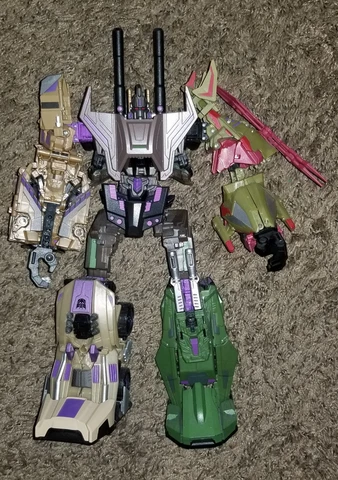 Transformers Fall of Cybertron Bruticus (Platinum Edition) with X-Transbots Kit Cover