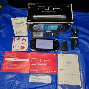SONY PSP GAME CONSOLE 1002 MODEL BLACK BOXED + CHARGER + BOOKS + 2G M. CARD + DE - Picture 1 of 21