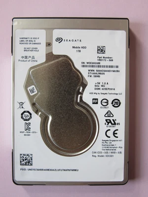 Seagate ST1000LM035 1RK172-568 7mm 1TB 2.5" HDD Sept 2016 China WU SBM3 WDE - Image 1 of 4