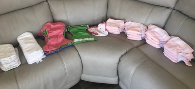 50 pc. lot Bumgenius cloth diapers, 16 Small, 10 One-Size covers; + inserts - Image 1 of 4