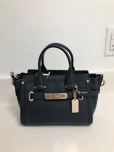 Borsa a tracolla Coach Swagger 20 in pelle ciottoli nuova con etichette 36235 blu navy/oro - Foto 1 di 4