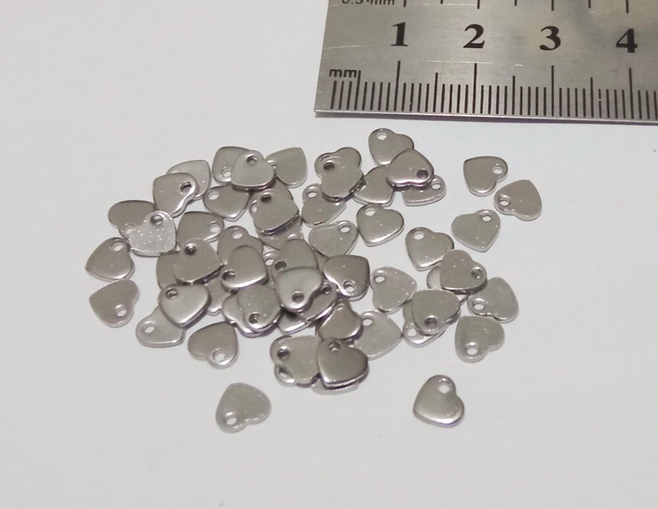 20pz charms ciondoli piastrina mini cuore in acciaio inox 5x6mm colore acciaio - Immagine 1 di 1