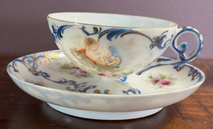 Taza de té y platillo antiguos Nippon NPSK Bone China pintados a mano con patas Japón - Imagen 1 de 11