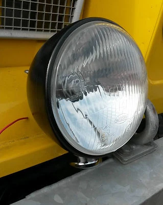 Lotus Caterham Oldtimer Scheinwerfer Headlamp Kompletteinheit schwarz 7" Felge & Webstuhl - Bild 1 von 4